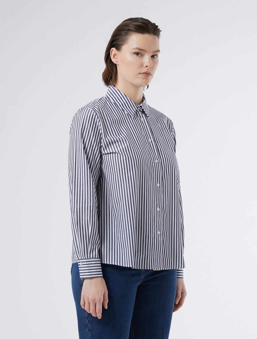 Persona camicia bianco seta blu sassari